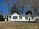 Charming ranch home with freshly painted exterior and landscaped yard at 10512 Roseberry Ct, Charlotte, NC 28277