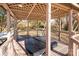 Covered hot tub in a gazebo in the backyard at 10512 Roseberry Ct, Charlotte, NC 28277
