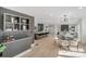 Open concept kitchen with an island and modern finishes, visible from the dining area at 10512 Roseberry Ct, Charlotte, NC 28277