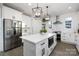 Modern kitchen with stainless steel appliances and white shaker cabinets at 10605 S Hampton Dr, Charlotte, NC 28227