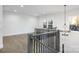 Spacious loft area with hardwood floors and elegant chandelier at 10605 S Hampton Dr, Charlotte, NC 28227