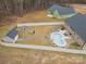 Aerial view showcasing pool, shed, and spacious backyard at 1076 Furnace Rd, Iron Station, NC 28080