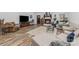 Spacious living room with a fireplace, hardwood floors, and neutral-colored furniture at 1076 Furnace Rd, Iron Station, NC 28080
