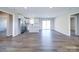 Bright and airy living room with open floor plan, stainless appliances, and kitchen island at 1112 Wiscassett St, Albemarle, NC 28001
