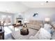 Relaxing living room with vaulted ceiling, fireplace, and large windows at 12813 Danby Rd, Indian Land, SC 29707