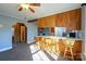 Kitchen with breakfast bar and wood cabinets at 170 Friendship Ln, Kannapolis, NC 28081