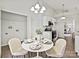 Cozy dining area with round table and chairs near kitchen and laundry area at 173 Brookshire Dr, Fort Mill, SC 29715