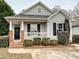 Charming craftsman style home with brick accents and a welcoming front porch at 173 Brookshire Dr, Fort Mill, SC 29715