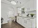Modern kitchen with white shaker cabinets, granite countertops and stainless steel appliances at 173 Brookshire Dr, Fort Mill, SC 29715