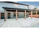 Gray metal barn-style home with covered porch at 219 Mock Mill Rd, Statesville, NC 28677