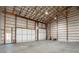 Spacious garage with two large doors and high ceilings at 219 Mock Mill Rd, Statesville, NC 28677