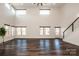 Bright living room featuring hardwood floors and high ceilings at 219 Mock Mill Rd, Statesville, NC 28677