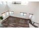 High ceiling living room with hardwood floors and many windows at 219 Mock Mill Rd, Statesville, NC 28677