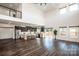 Open concept living area with kitchen, loft, and hardwood floors at 219 Mock Mill Rd, Statesville, NC 28677