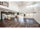 Open concept living area with kitchen, loft, and hardwood floors at 219 Mock Mill Rd, Statesville, NC 28677