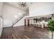 Two-story living room with hardwood floors and lots of natural light at 219 Mock Mill Rd, Statesville, NC 28677