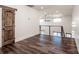 Spacious loft area with dark wood flooring and a ceiling fan at 219 Mock Mill Rd, Statesville, NC 28677