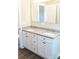 Bathroom vanity featuring double sinks, granite countertops, and modern fixtures at 2220 Badin Rd, Albemarle, NC 28001
