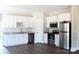 Beautiful kitchen with stainless steel appliances, granite countertops, and white cabinets at 2220 Badin Rd, Albemarle, NC 28001
