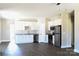 Open kitchen features stainless steel appliances and a large island at 2220 Badin Rd, Albemarle, NC 28001