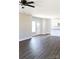 Open layout featuring kitchen with white cabinets and view to front door at 2220 Badin Rd, Albemarle, NC 28001