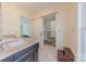 Bathroom with barn door to spacious closet at 2420 Carson Dr, Waxhaw, NC 28173