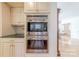 Built-in double oven and microwave in the kitchen at 2420 Carson Dr, Waxhaw, NC 28173