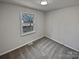 Cozy bedroom with carpet flooring and a window with a view at 2804 Lyndell Way, Lancaster, SC 29720