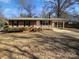 Brick ranch home with a carport and well-maintained lawn at 2804 Lyndell Way, Lancaster, SC 29720