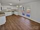 Bright kitchen features white cabinets, stainless steel appliances, and vinyl flooring at 2804 Lyndell Way, Lancaster, SC 29720