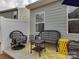 Cozy backyard patio seating with colorful rug and ample space for relaxing at 3020 Graceland Cir # 11D, Pineville, NC 28134