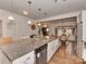 Modern kitchen featuring granite countertops, stainless steel appliances, and an open layout at 3020 Graceland Cir # 11D, Pineville, NC 28134