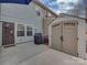 Outdoor patio area with storage shed, grill, and access to backyard at 3020 Graceland Cir # 11D, Pineville, NC 28134