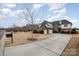 Brick two-story house with a three-car garage and landscaped yard at 3408 Out Of Bounds Dr, Monroe, NC 28112