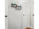 Bright hallway with floating shelves and blue accents at 3510 Oakwood Ave, Claremont, NC 28610