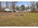 White single wide home nestled on a wooded lot at 3510 Oakwood Ave, Claremont, NC 28610