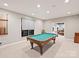 Enjoy a game room featuring a classic pool table and ample space at 3827 Bramwyck Dr, Charlotte, NC 28210