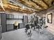 Home gym with a variety of modern exercise equipment and ample space at 3827 Bramwyck Dr, Charlotte, NC 28210