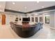 Spacious living room featuring a large sofa and entertainment area at 3827 Bramwyck Dr, Charlotte, NC 28210