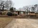 Brick ranch home with a spacious yard and parking at 4818 Highlake Dr, Charlotte, NC 28215