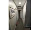 Hallway with carpet flooring and doors to bedrooms at 4818 Highlake Dr, Charlotte, NC 28215