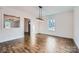 Dining room with hardwood floors and a large window at 502 E 2Nd St, Salisbury, NC 28146