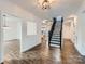 Bright entryway with hardwood floors and a staircase at 502 E 2Nd St, Salisbury, NC 28146