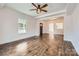 Living room with hardwood floors and a view into the entryway at 502 E 2Nd St, Salisbury, NC 28146