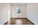 Spacious office with wood-look flooring and large window at 502 E 2Nd St, Salisbury, NC 28146