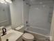 Clean bathroom with tub, toilet and sink at 5024 Victoria Ave, Charlotte, NC 28269