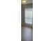 Well-lit bedroom with hardwood floors and window blinds at 5024 Victoria Ave, Charlotte, NC 28269