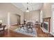 Another view of the inviting living room, highlighting the coffered ceiling and fireplace at 557 Medora Ln, Fort Mill, SC 29708