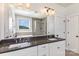 Luxurious bathroom with double sink vanity, large mirror, walk-in shower, and soaking tub at 630 Daventry Ct, Clover, SC 29710