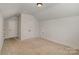 Bedroom featuring carpet, two closets, and a cozy atmosphere at 630 Daventry Ct, Clover, SC 29710